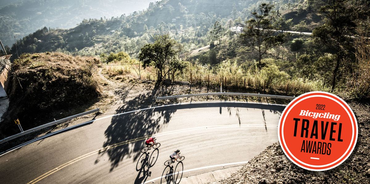 two riders prepare for a descent in the eastern range of the colombian andes mountains